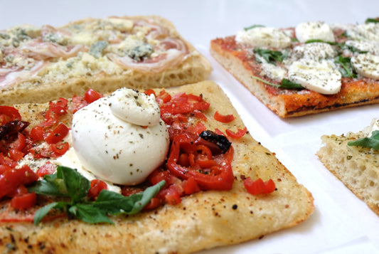 Specialty pizzas garnished with soft upscale Italian cheeses and more. Delicious!